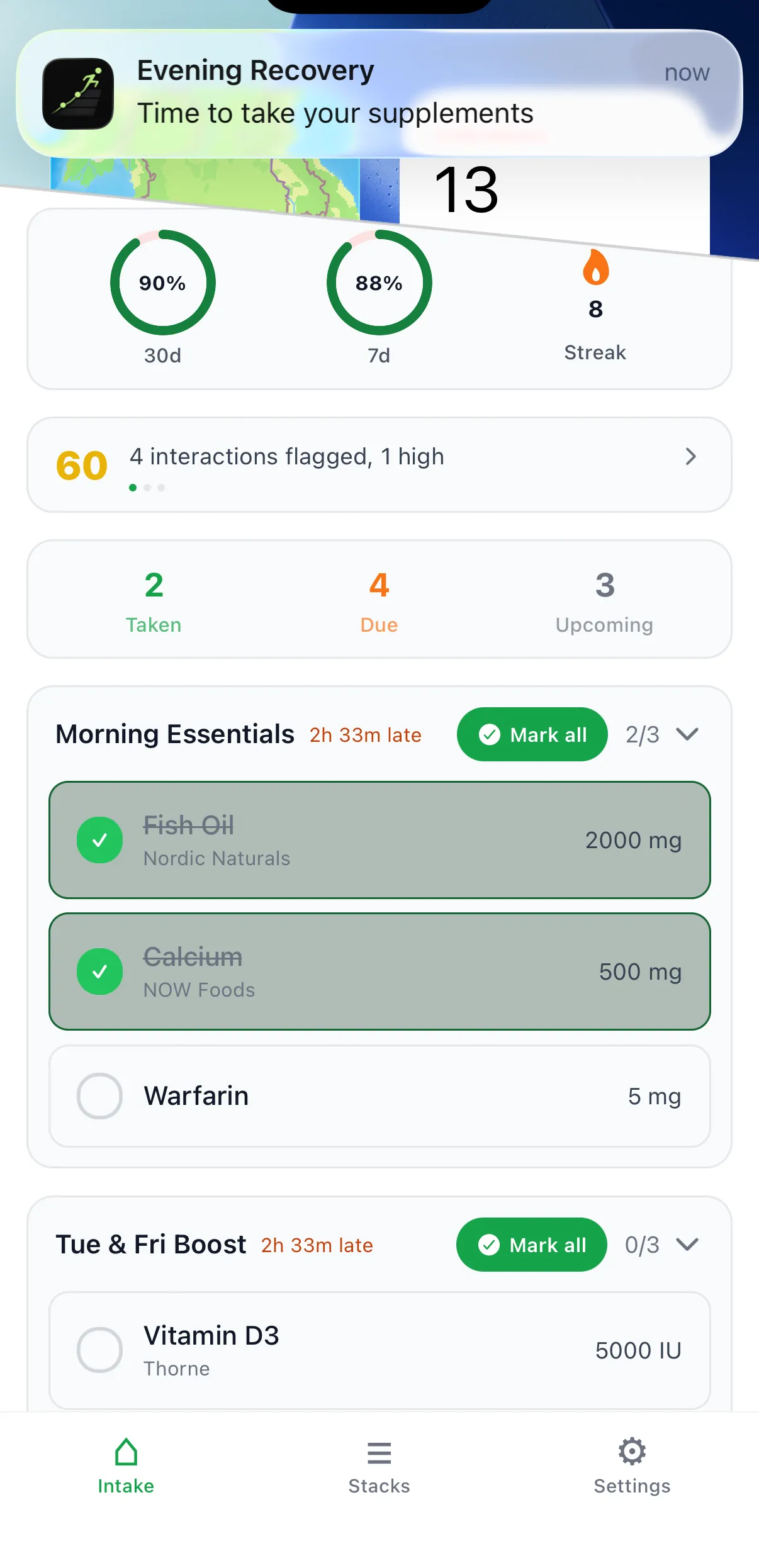 Daily intake view with a supplement reminder notification